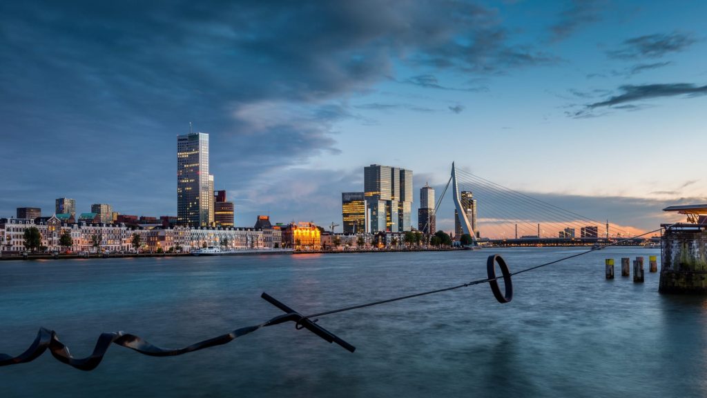 Rotterdam skyline with Erasmus bridge and setting sun