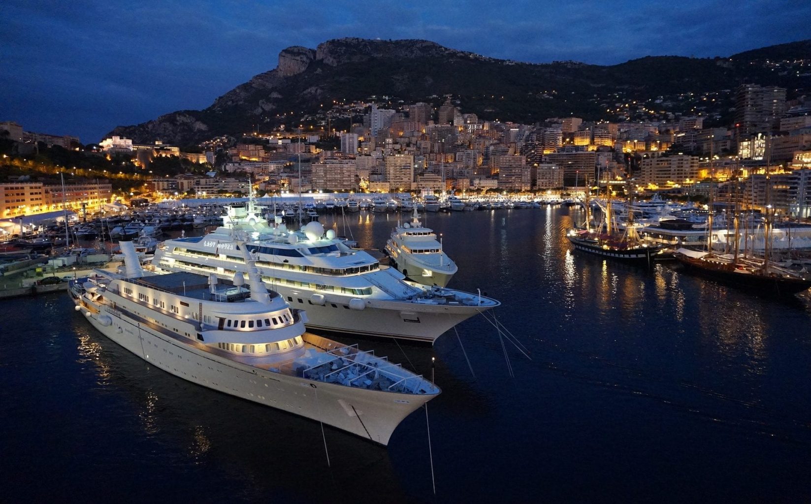 Yachts displayed at night at the harbour of Monaco